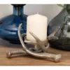 LITTON LANE 4 in. Silver Aluminum Crossed Antlers Candle Holder